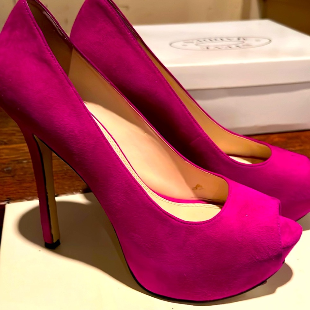 Fair condition, some discoloration at toe part and back of heel